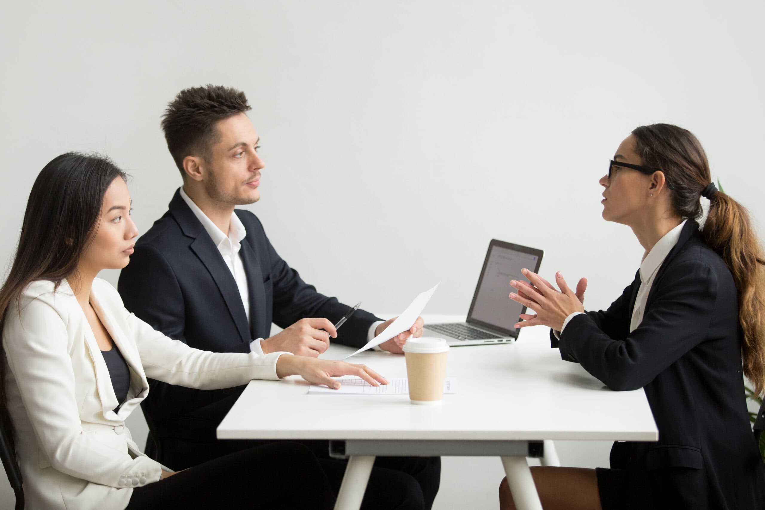 A candidate meeting with recruitment professionals
