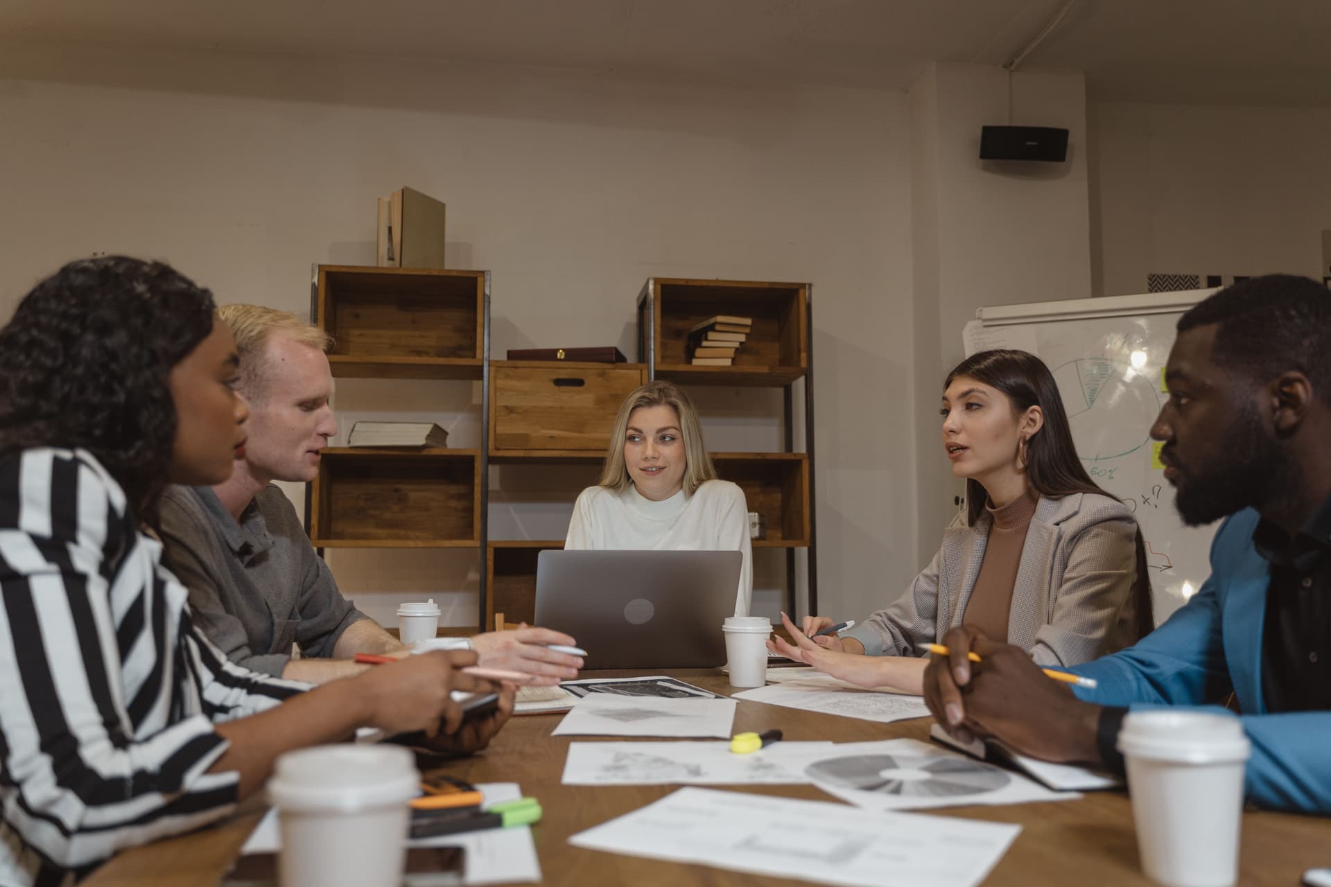Recruitment team reviewing candidate files